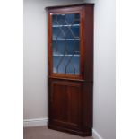 Georgian mahogany double corner cabinet, astragal glazed door with painted interior,