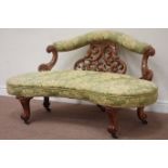 Victorian walnut framed kidney shaped settee, fret work and carved back supports,