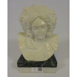 Carved marble bust on marble stand,