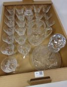 Set of twelve crystal drinking glasses, similar set of six smaller glasses,
