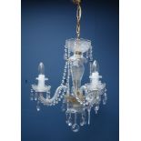 Three branch glass chandelier with cut glass drops,
