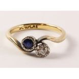 Sapphire and diamond cross-over ring stamped 18ctplat Condition Report <a