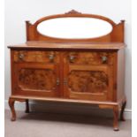 20th century walnut and figured walnut sideboard, two cupboards and two drawers, W137cm, H138cm,