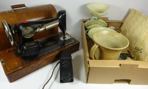 Singer sewing machine, brass finish desk lamp, book ends, hat pins,