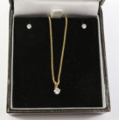 Diamond pendant necklace hallmarked 18ct and pair of diamond ear-rings Condition Report