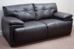 Two seat sofa upholstered in chocolate brown leather,