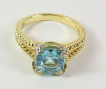 Sky blue topaz silver-gilt ring with rope twist shoulders stamped 925 Condition Report