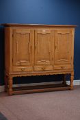 French light oak sideboard enclosed by three panelled doors, with three drawers, W158cm, H142cm,