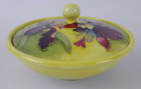 Moorcroft lidded dish decorated with orchids, D16.