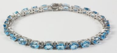 Blue topaz and diamond white gold bracelet stamped 750 Condition Report <a