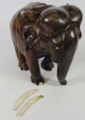 Carved Lignum vitae elephant H. 25cms Condition Report <a href='//www.