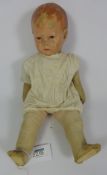 Early 20th Century hand painted cloth doll with articulated body,