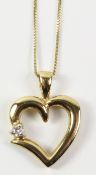 9ct gold heart pendant set with a diamond hallmarked on necklace stamped 10kt Condition