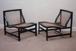 Pair black finish easy chairs with string work seat and back Condition Report