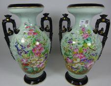 Pair of late 19th Century continental urn shaped vases with hand painted decoration,