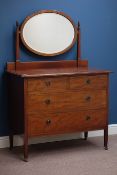 Edwardian mahogany dressing chest, two short and two long drawers, oval bevelled mirror back,