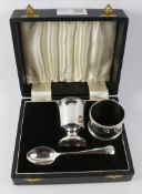 Hallmarked silver egg cup and spoon boxed and a similar napkin ring approx 3oz Condition