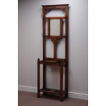 Early 20th century oak hall stand, mirror back and hinged glove compartment, W65cm, H199cm,