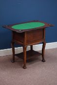 20th century oak swivel fold over baize lined top games table,
