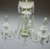 Three branch glass chandelier with cut glass drops Condition Report <a