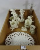 Four ivory ceramic Cherub figures, two Staffordshire sheep,