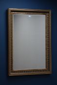 Rectangular gilt framed bevelled edge wall mirror,