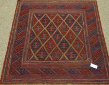 Tribal Gazak red and blue ground rug,