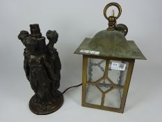 Brass and mottled glass lantern and an 19th/ early 20th Century bronzed figural lamp (2)