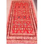 Persian Arak red ground rug, 325cm x 170cm Condition Report <a href='//www.