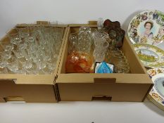 Drinking glass sets, two carnival glass bowls, coloured glass paperweight,