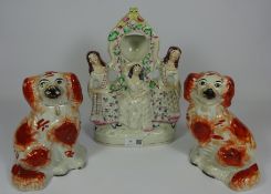 Pair of Victorian Staffordshire Spaniels and a Staffordshire flat back pocket watch holder (3)