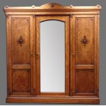 Edwardian triple satinwood wardrobe, inlaid marquetry with carved mounts,