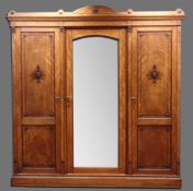 Edwardian triple satinwood wardrobe, inlaid marquetry with carved mounts,