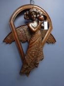 Large carved mahogany wall hanging figure of an angel H.75cms approx.