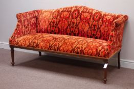 Early 20th century mahogany two seat settee upholstered in rust cover,