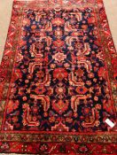 Persian Hamadan red and blue ground rug,