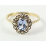 Aquamarine and diamond cluster ring hallmarked 9ct Condition Report <a