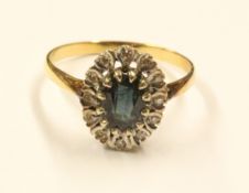 Sapphire and diamond cluster gold ring hallmarked 18ct Condition Report <a