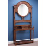 Early 20th century oak hall stand with circular bevelled mirror and drawer, W94cm, H202cm,