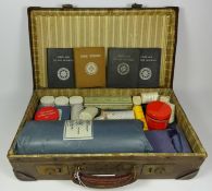 World War II first aid kit including St John Ambulance 'First Aid To The Injured' textbooks in