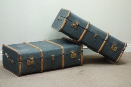 Two 20th century wood bound trunks with carrying handles,
