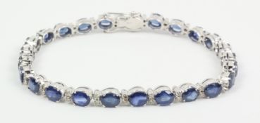 Oval sapphire and diamond bracelet stamped 18k Condition Report <a href='//www.