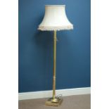 Brass standard lamp with shade,