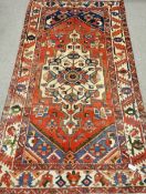 Persian Bakhtiar hand knotted rug, central pole medallion, red ground,