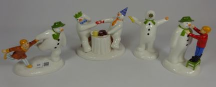 Four Coalport Snowman figures - 'Pulling a Cracker', 'Adding a Smile',