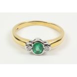 Emerald and diamond three stone gold ring hallmarked 18ct Condition Report <a
