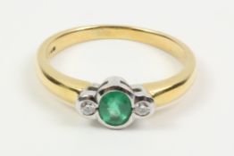 Emerald and diamond three stone gold ring hallmarked 18ct Condition Report <a