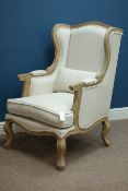 French style wingback armchair upholstered in natural fabric Condition Report