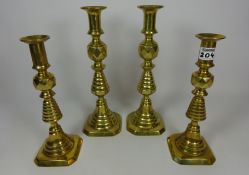 Two pairs of Queen of diamonds style brass candlesticks Condition Report <a