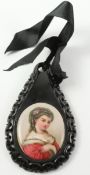 Victorian polished Whitby jet tear-drop shaped pendant with pierced scroll border,
